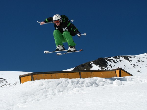 A skier (unnamed) jumps the pipe in the Tararua Real Ice Coffee (TRIC) Beginner Park in the 2009 Parklife Youth Mini Shred Competition series.